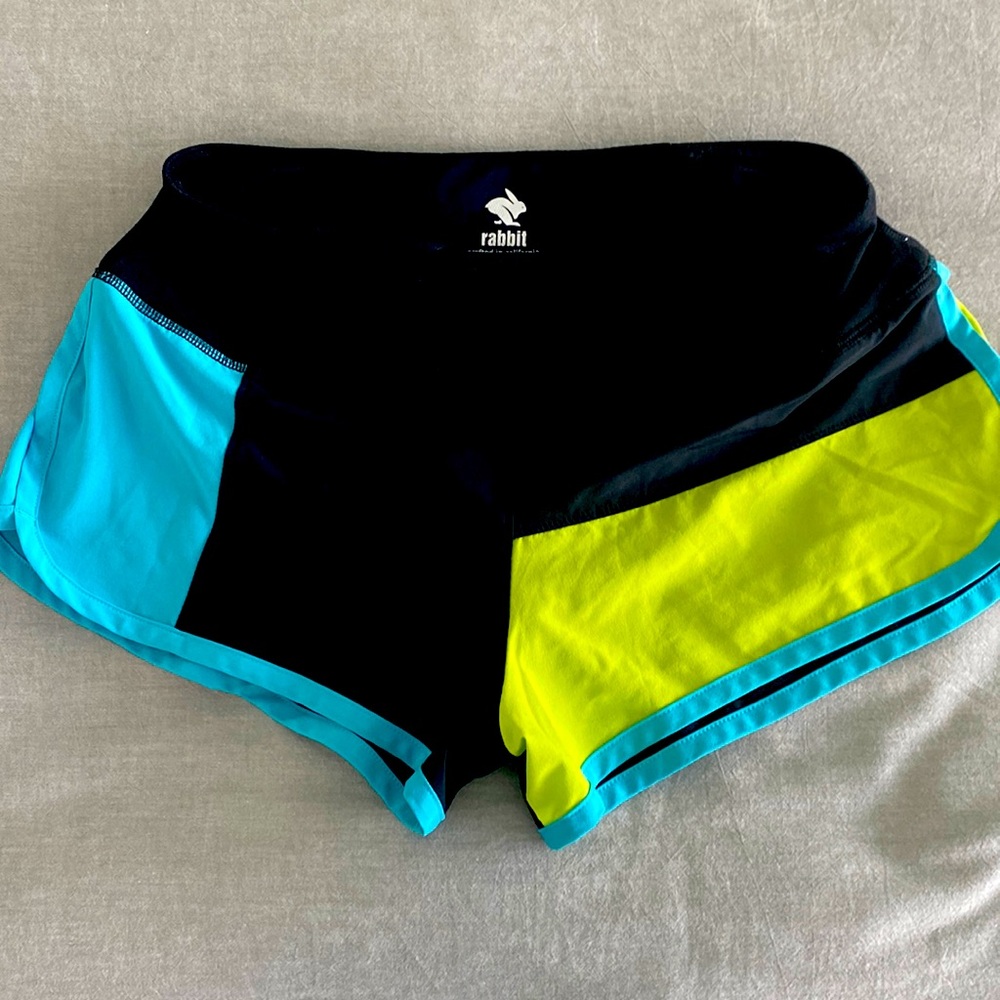 Like new! Rabbit running short. Color block black and green. Size small.